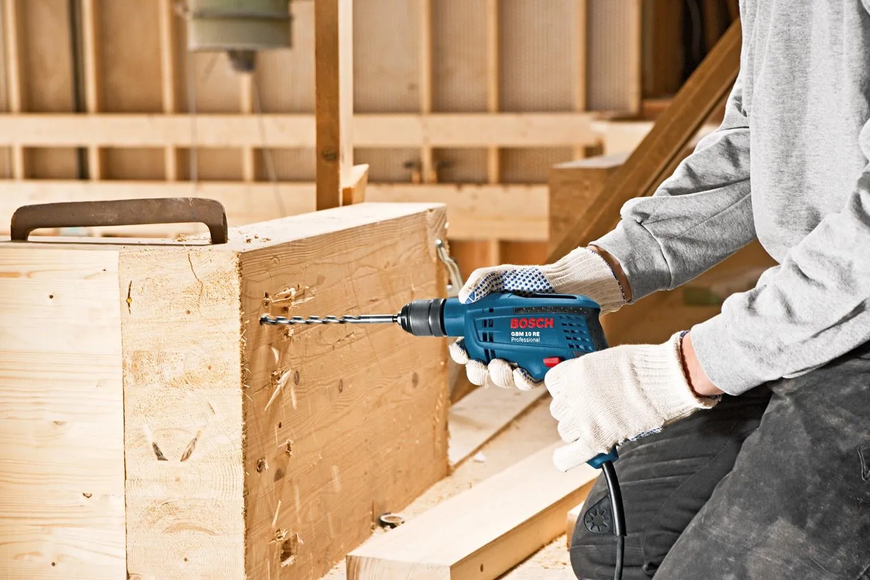 Дриль електричний безударний Bosch Professional GBM 10 RE (0601473600) 726403 фото
