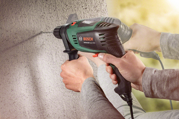 Дриль ударний Bosch UniversalImpact 800 в чемодані (0603131120) 726405 фото
