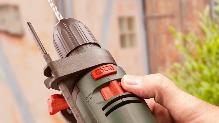 Дрель ударная Bosch UniversalImpact 700 в чемодане (0603131020) 726404 фото