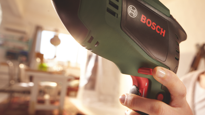 Дрель ударная Bosch UniversalImpact 700 в чемодане (0603131020) 726404 фото